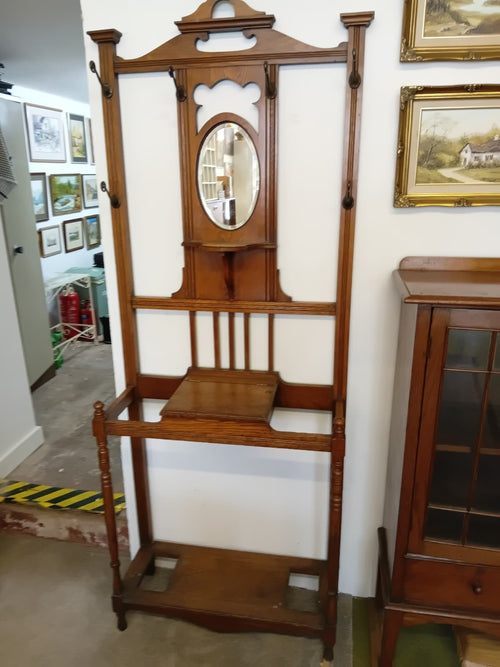 Victorian hall stand with oval mirror, coat hooks and umbrella stand